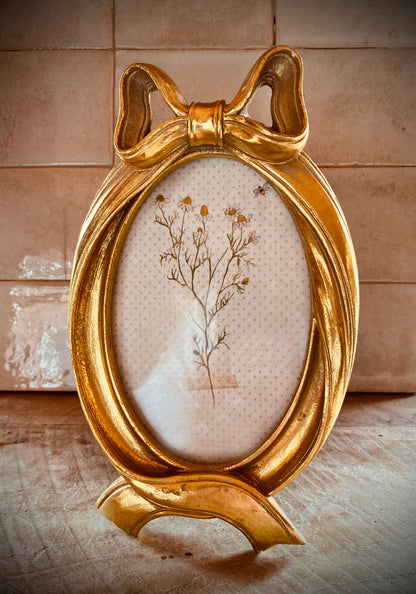 Fotolijst met Strik 10x15 cm – Goudkleurig – Kunststof en Glas – Ovaal Fotokader